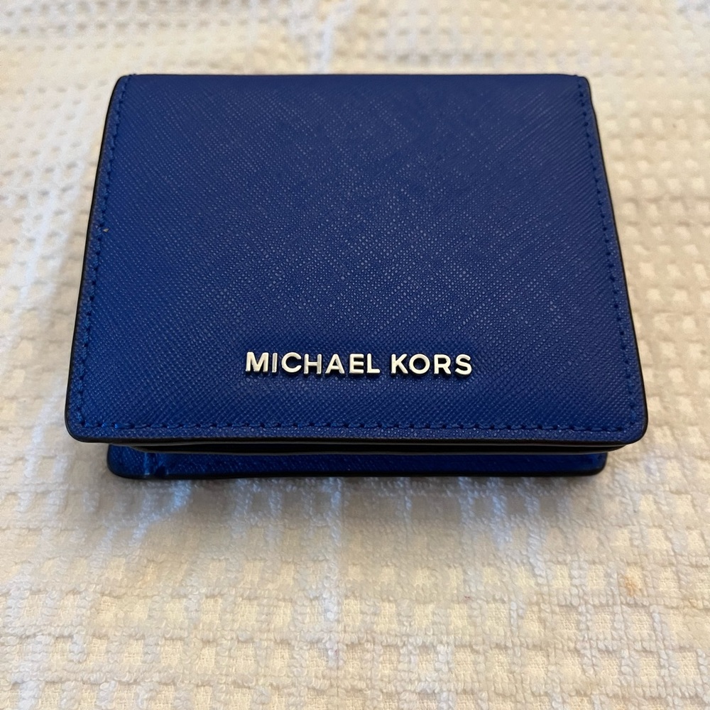 Michael  Kors unique electric blue wallet. Hold cash, change and 7 credit cards
